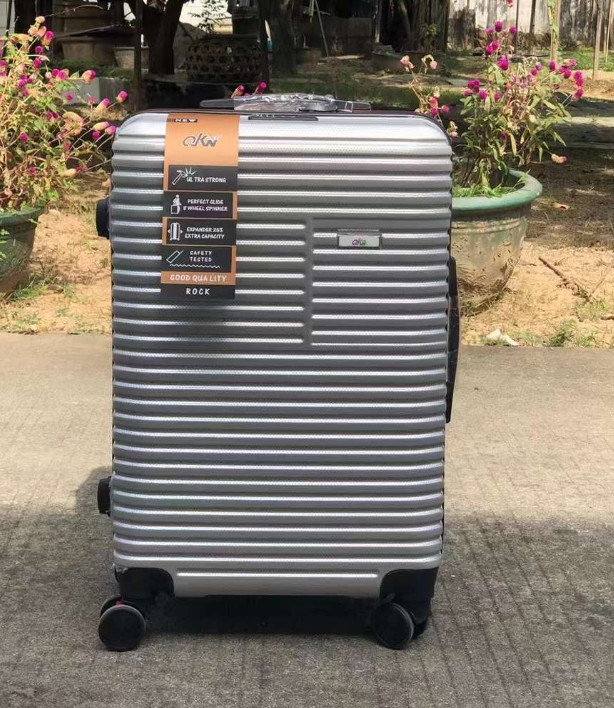 Aluminiowa ramka Twarda Strona Rolowana Zipper Flight Case OEM ODM Niestandardowa etykieta anty-szramki bagaż podróży walizka z 4 Whee